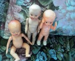 3 plastic baby dolls